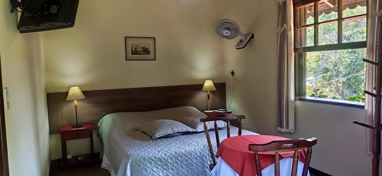Quarto Quádruplo com Varanda